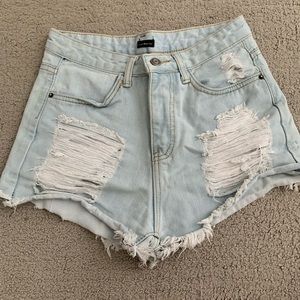 Distressed denim shorts